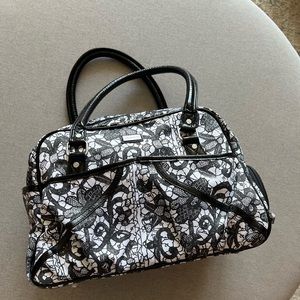 LULULEMON GYM BAG- LIMITED EDITION  in black and white floral lace design 15”x9”